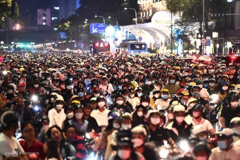 saigon-food-tour-by-night-back-of-a-motorbike2 1